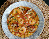 Foto del paso 16 de la receta: Garbanzos con langostinos, almejas y jamón