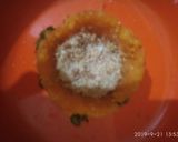 A picture of step 3 of Ladoo cups with Rabri filling busicuits crums.