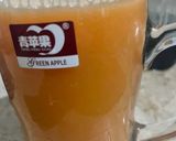 A picture of step 4 of Orange twister juice.