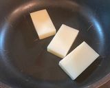 A picture of step 1 of Isobe Yaki - Japanese grilled rice cake with soy sauce, sugar and seaweed.
