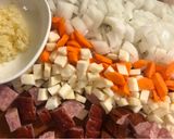 A picture of step 2 of Vegetable, Meat, and Orzo Soup with Zucchini and Country Sausage.