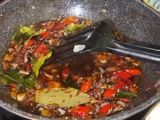 Cumi masak tinta pedas