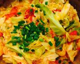 A picture of step 4 of Stir-Fried Cabbage with Tomato.