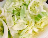 A picture of step 1 of Stir-Fried Cabbage with Tomato.