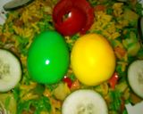 A picture of step 6 of Potato fried rice and meat fried rice with coloured eggs.