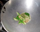A picture of step 2 of Tamatar khatta.