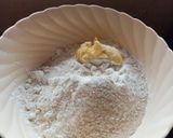 A picture of step 2 of Bread rolls.