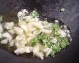 A picture of step 7 of Orange flavour sweet & sour soup with besan ravioli.