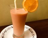 A picture of step 3 of Papaya-banana -orange smoothie.