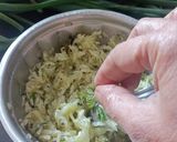 A picture of step 5 of Cucumber,Mint and Lemon grass Koshimbir with Tulsi leaves.