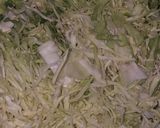 A picture of step 1 of Cabbage green peas dry curry.