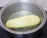 Foto del paso 8 de la receta: Calabacín relleno con pollo