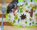 A picture of step 3 of Dry fruits and matar pulao.