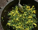 A picture of step 3 of Muli ka saag stir fried with besan (Radish greens with Gram flour).
