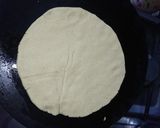 A picture of step 6 of Saag with makae ki roti.