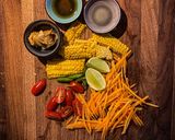 A picture of step 1 of Spicy-sweet corns salad with prawn or Tam Khaw Phod.