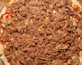 Foto del paso 11 de la receta: Pizza de hojaldre con ternera picada y champiñones