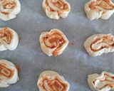 A picture of step 2 of Sun dried tomato pizza spirals.