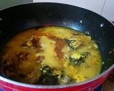 A picture of step 5 of Muri Ghonto (Fish head curry with lentils).