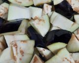 A picture of step 1 of Brinjal potato curry.