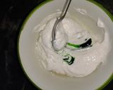 A picture of step 3 of Orange lemon posset shoters.