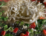Foto del paso 8 de la receta: Paella de frutos del mar con gambones congelados