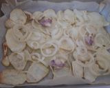 Foto del paso 5 de la receta: Dorada al horno con almejas, gambón, patatas y chipirones