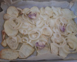 Foto del paso 5 de la receta: Dorada al horno con almejas, gambón, patatas y chipirones