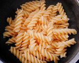 A picture of step 4 of Crispy Edible Diyas filled with Pasta Chat.