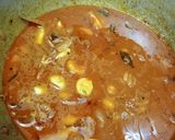 A picture of step 12 of வெள்ளைப்பூண்டு குச்சி கருவாட்டு குழம்பு.