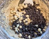 A picture of step 4 of Copycat Mrs. Field's Chocolate Chip Macadamia Nut Cookies.