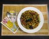 A picture of step 8 of Kung pao chicken with egg fried rice.