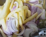 A picture of step 5 of Onion Stuffed Karela.