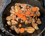 A picture of step 5 of Chicken Rice One Skillet.