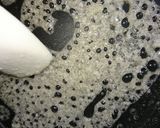 A picture of step 3 of Chocolate and biscuit salami.