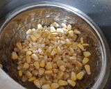A picture of step 1 of Mall PVR style spicy corn black salt butter masala.