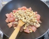 A picture of step 12 of Chicken with Cashews, Bell Peppers, and Carrots.