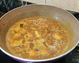 A picture of step 8 of Raw papaya curry.