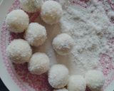 A picture of step 3 of Chocolate coated Hazelnut filled coconut laddu.