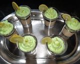 A picture of step 6 of Orange lemon posset shoters.