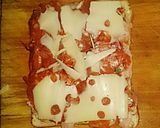 A picture of step 10 of Tex's Pizza Toastie 🐷🧀 🍞🌿🍕.