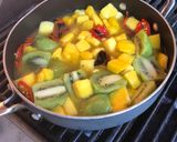 A picture of step 3 of Kiwi Mango hot sauce.