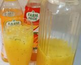 A picture of step 2 of Orange mango refreshing drink.