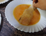 Foto del paso 4 de la receta: Filetes de merluza empanados con patatas en 25 minutos
