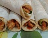 A picture of step 5 of Zinger Shawarma with homemade pita bread❤😋.