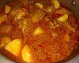 A picture of step 4 of Aloo chicken.