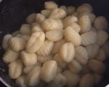 A picture of step 6 of Gnochi with Mushrooms and Pine Nuts.