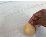 A picture of step 10 of Coconut Sesame Seeds Dinner Rolls.