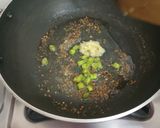 A picture of step 2 of Burmese samosa curry with saffron rice.