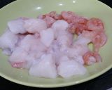 A picture of step 2 of Seafood paella with artichokes.